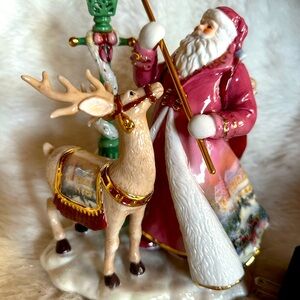 Santa and Reindeer Holiday Figurine collectible. ( Now is the time to buy it)